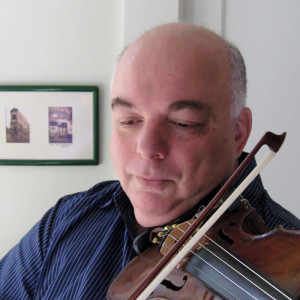 Musician Nathan Ladyzhensky with violin